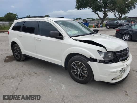 2018 Dodge Journey SE with VIN 3C4PDCAB9JT491354, listed as a Copart auction lot 70309975 with 87,285 mi miles and Salvage title. Bid and sale history available at DreamBid. Image 4.