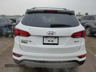 2018 Hyundai Santa Fe 2.4L z VIN 5XYZU3LB7JG535123, wystawiony jako Copart lot #71898235 z przebiegiem 109 333 mil mil oraz Szkoda całkowita • Salvage title. Historia ofert i sprzedaży dostępna na DreamBid. Obrazek 6.