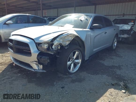 ✅ 2014 Dodge Charger Police • VIN: 2C3CDXAT6EH347732 • Lot: 43388299. Listed on IAAI with 144,952 mi. Free auction sales archive from the USA and detailed vehicle history report at DreamBid. Image 2.