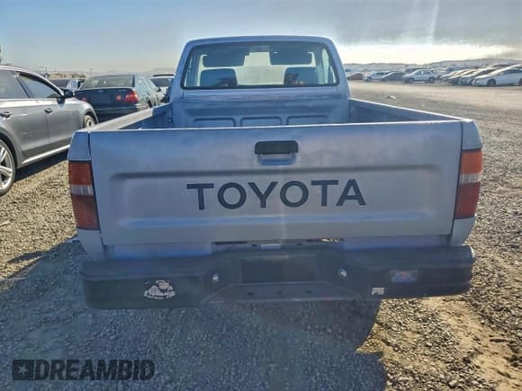 ✅ 1991 Toyota Pickup • VIN: JT4RN81A7M0065206 • Lot: 96237665. Listed on Copart with 301,033 mi. Free auction sales archive from the USA and detailed vehicle history report at DreamBid. Image 6.