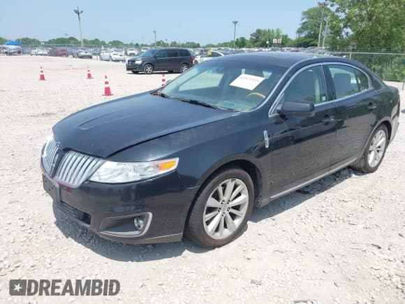 ✅ 2009 Lincoln MKS • VIN: 1LNHM94R59G605832 • Lot: 42521335. Listed on IAAI with 114,085 mi. Free auction sales archive from the USA and detailed vehicle history report at DreamBid. Image 2.