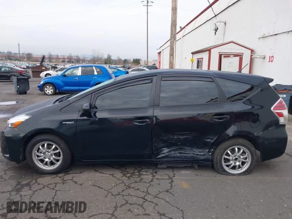 ✅ 2015 Toyota Prius Two • VIN: JTDZN3EU4FJ020552 • Lot: 41760514. Listed on IAAI with 234,183 mi. Free auction sales archive from the USA and detailed vehicle history report at DreamBid. Image 14.