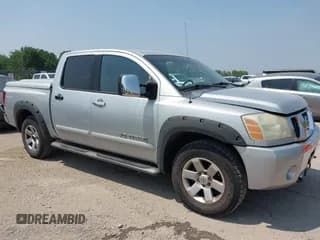 ✅ 2005 Nissan Titan LE • VIN: 1N6AA07B15N501740 • Lot: 42433726. Listed on IAAI with 130,450 mi. Free auction sales archive from the USA and detailed vehicle history report at DreamBid. Image 1.