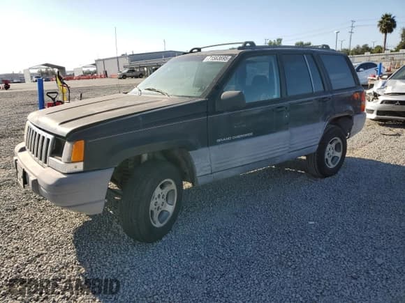 ✅ 1998 Jeep Grand Cherokee Laredo • VIN: 1J4FX58S6WC294787 • Лот: 71563695. Опубликован ранее на Copart с пробегом 198 537 миль. Бесплатный доступ к архиву аукционных продаж из США и подробный отчёт об истории автомобиля на DreamBid. Изображение 1.