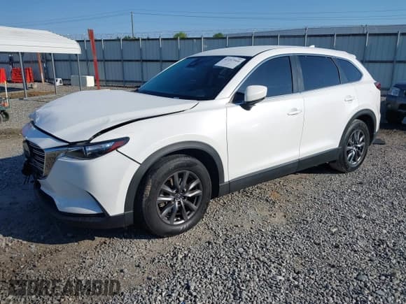 ✅ 2021 Mazda CX-9 Sport • VIN: JM3TCABY1M0501408 • Lot: 42257940. Listed on IAAI with 62,228 mi. Free auction sales archive from the USA and detailed vehicle history report at DreamBid. Image 17.
