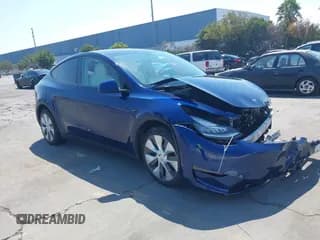 ✅ 2023 Tesla Model Y Long Range • VIN: 7SAYGDEE7PA156123 • Lot: 43213377. Listed on IAAI with 28,471 mi. Free auction sales archive from the USA and detailed vehicle history report at DreamBid. Image 1.