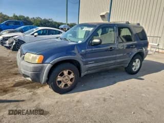 ✅ 2001 Ford Escape XLT • VIN: 1FMYU03121KC39322 • Lot: 94912905. Listed on Copart with 211,075 mi. Free auction sales archive from the USA and detailed vehicle history report at DreamBid. Image 1.