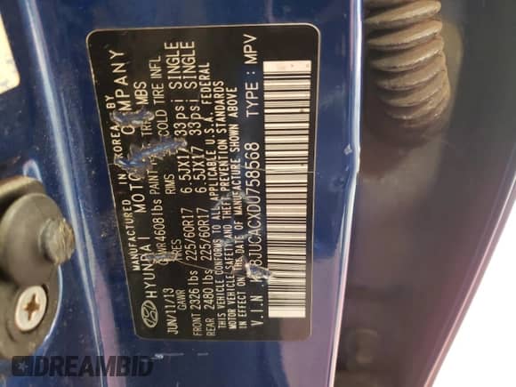 2013 Hyundai Tucson GLS z VIN KM8JUCACXDU758568, wystawiony jako Copart lot #72167974 z przebiegiem 188 013 mil mil oraz Szkoda całkowita • Salvage title. Historia ofert i sprzedaży dostępna na DreamBid. Obrazek 13.