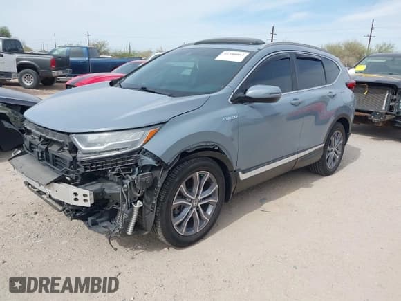 ✅ 2020 Honda CR-V Touring • VIN: 7FART6H99LE012081 • Lot: 42350064. Listed on IAAI with 46,570 mi. Free auction sales archive from the USA and detailed vehicle history report at DreamBid. Image 2.