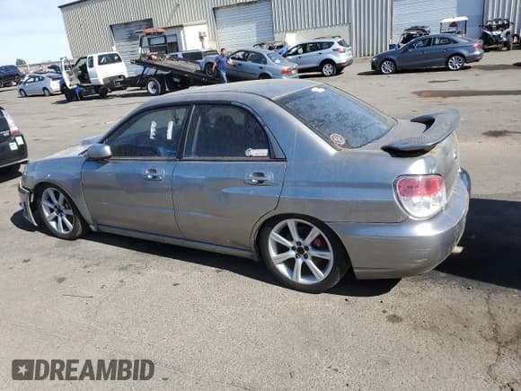 ✅ 2007 Subaru Impreza WRX • VIN: JF1GD74637G506780 • Lot: 70700054. Listed on Copart with 154,645 mi. Free auction sales archive from the USA and detailed vehicle history report at DreamBid. Image 2.