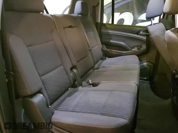 2018 Chevrolet Suburban LS с VIN 1GNSCGKC0JR278370, выставлен на аукционе Copart как лот 57657395 с пробегом 224 903 миль миль и Чистый • Clean title. История ставок и продаж доступна на DreamBid. Изображение 11.