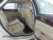 ✅ 2014 Lincoln MKZ Hybrid • VIN: 3LN6L2LU2ER817257 • Lot: 43149857. Listed on IAAI with 117,590 mi. Free auction sales archive from the USA and detailed vehicle history report at DreamBid. Image 8.