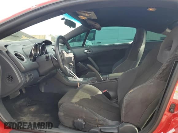 ✅ 2006 Mitsubishi Eclipse GT • VIN: 4A3AK34T76E013678 • Лот: 81664295. Опубликован ранее на Copart с пробегом 186 637 миль. Бесплатный доступ к архиву аукционных продаж из США и подробный отчёт об истории автомобиля на DreamBid. Изображение 7.