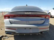 ✅ 2023 Kia K5 GT-Line • VIN: 5XXG64J29PG210013 • Лот: 85196265. Опубликован ранее на Copart с пробегом 16 912 миль. Бесплатный доступ к архиву аукционных продаж из США и подробный отчёт об истории автомобиля на DreamBid. Изображение 6.