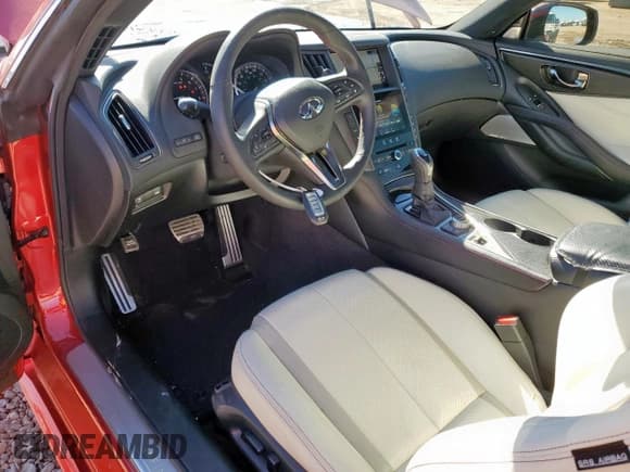 ✅ 2022 Infiniti Q60 Red Sport 400 • VIN: JN1FV7LK8NM660520 • Lot: 90478675. Listed on Copart with 9,916 mi. Free auction sales archive from the USA and detailed vehicle history report at DreamBid. Image 8.