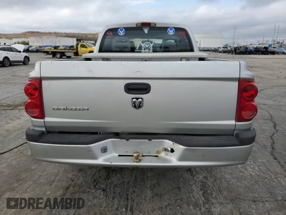 2006 Dodge Dakota ST z VIN 1D7HE28K76S641283, wystawiony jako Copart lot #78939474 z przebiegiem 229 561 mil mil oraz Szkoda całkowita • Salvage title. Historia ofert i sprzedaży dostępna na DreamBid. Obrazek 6.