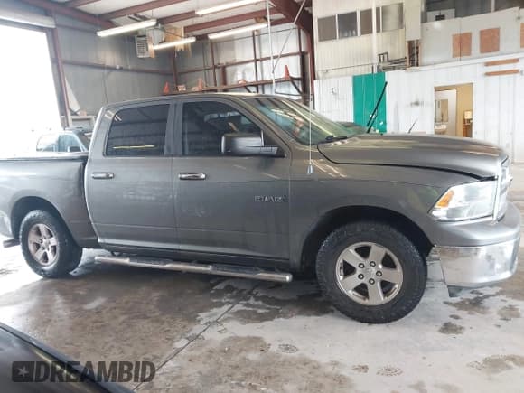 ✅ 2010 Dodge 1500 TRX • VIN: 1D7RB1CP0AS132381 • Lot: 43555136. Listed on IAAI with 220,041 mi. Free auction sales archive from the USA and detailed vehicle history report at DreamBid. Image 13.