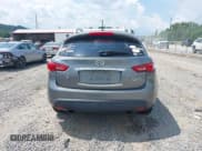 ✅ 2014 Infiniti QX70 • VIN: JN8CS1MW5EM411653 • Lot: 42690935. Listed on IAAI with 110,806 mi. Free auction sales archive from the USA and detailed vehicle history report at DreamBid. Image 16.