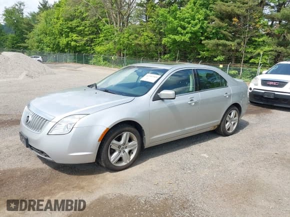 ✅ 2011 Mercury Milan • VIN: 3MEHM0HA5BR602401 • Лот: 42287369. Опубликован ранее на IAAI с пробегом 100 139 миль. Бесплатный доступ к архиву аукционных продаж из США и подробный отчёт об истории автомобиля на DreamBid. Изображение 2.