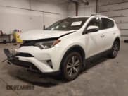 ✅ 2018 Toyota RAV4 XLE • VIN: JTMRFREVXJJ208445 • Lot: 43644382. Listed on IAAI with 138,513 mi. Free auction sales archive from the USA and detailed vehicle history report at DreamBid. Image 2.