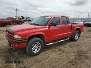 2002 Dodge Dakota Sport z VIN 1B7HG38N52S721308, wystawiony jako Copart lot #81450285 z przebiegiem 126 552 mil mil oraz Czysty tytuł • Clean title. Historia ofert i sprzedaży dostępna na DreamBid. Obrazek 1.
