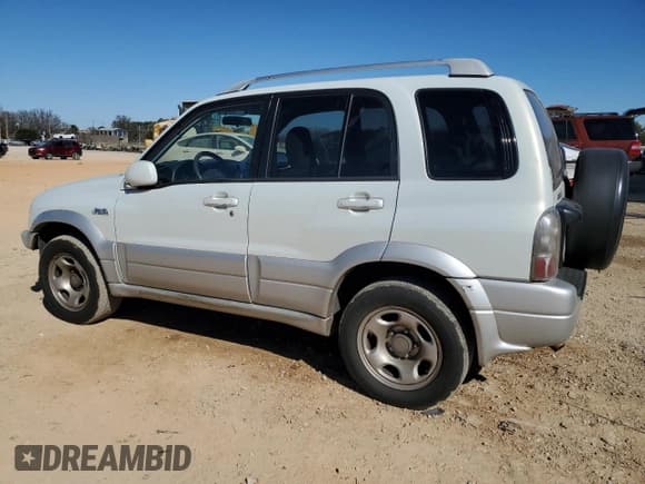 ✅ 2005 Suzuki Grand Vitara LX • VIN: JS3TD62V054100520 • Lot: 47001355. Wystawiony na Copart z przebiegiem 154 181 mil. Bezpłatny archiwum sprzedaży aukcyjnych z USA i szczegółowy raport historii pojazdu na DreamBid. Zdjęcie 2.