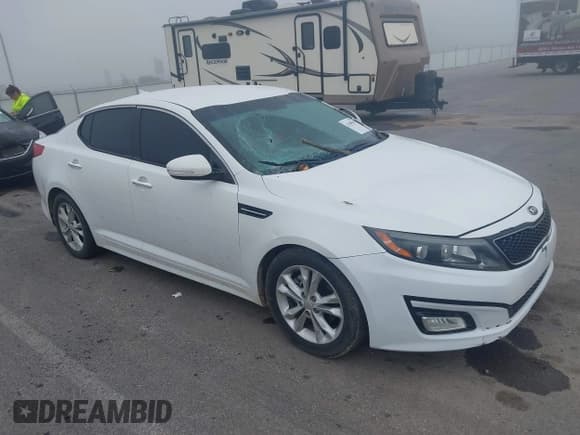 ✅ 2014 Kia Optima LX • VIN: 5XXGM4A71EG303834 • Lot: 42380350. Listed on IAAI with 148,359 mi. Free auction sales archive from the USA and detailed vehicle history report at DreamBid. Image 1.