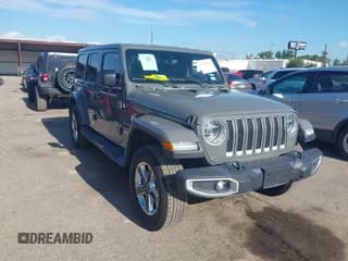 ✅ 2020 Jeep Wrangler Unlimited Sahara • VIN: 1C4HJXEN8LW166829 • Lot: 42597701. Listed on IAAI with 97,427 mi. Free auction sales archive from the USA and detailed vehicle history report at DreamBid. Image 1.