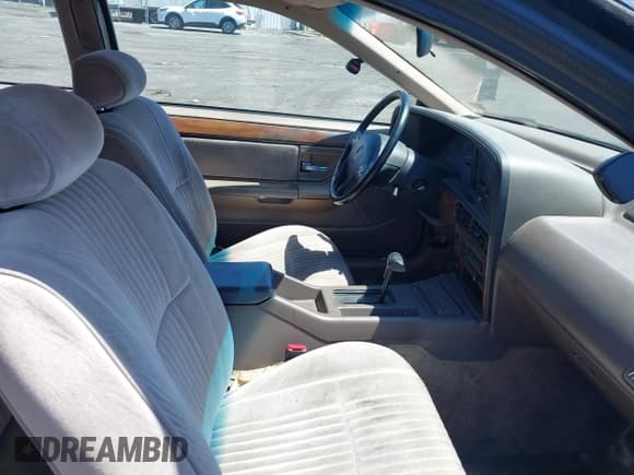 ✅ 1992 Mercury Cougar • VIN: 1MEPM6043NH646925 • Lot: 42128701. Listed on IAAI with 37,103 mi. Free auction sales archive from the USA and detailed vehicle history report at DreamBid. Image 5.