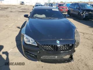 ✅ 2016 BMW M6 • VIN: WBS6E9C54GGF92636 • Lot: 89693055. Wystawiony na Copart z przebiegiem 75 867 mil. Bezpłatny archiwum sprzedaży aukcyjnych z USA i szczegółowy raport historii pojazdu na DreamBid. Zdjęcie 5.