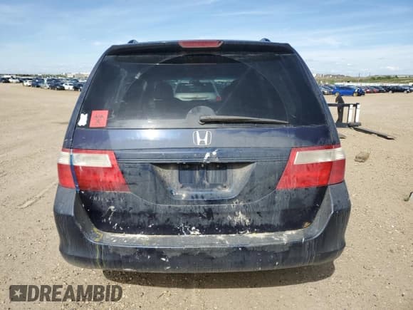 ✅ 2006 Honda Odyssey EX-L • VIN: 5FNRL38706B128265 • Лот: 58715415. Опубликован ранее на Copart с пробегом 377 656 миль. Бесплатный доступ к архиву аукционных продаж из США и подробный отчёт об истории автомобиля на DreamBid. Изображение 6.