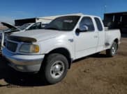 ✅ 1999 Ford F-150 XL • VIN: 1FTRX08L3XKA57809 • Lot: 91516805. Listed on Copart with 204,081 mi. Free auction sales archive from the USA and detailed vehicle history report at DreamBid. Image 1.