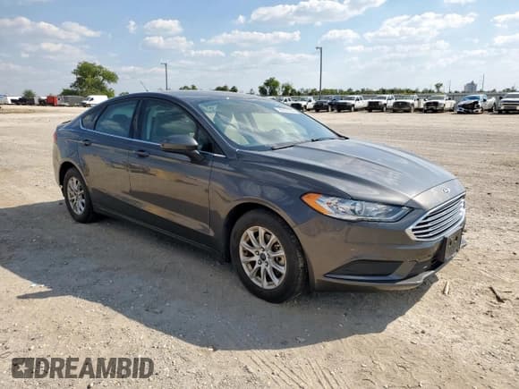 ✅ 2018 Ford Fusion S • VIN: 3FA6P0G70JR284892 • Лот: 85107335. Опубликован ранее на Copart с пробегом 77 544 миль. Бесплатный доступ к архиву аукционных продаж из США и подробный отчёт об истории автомобиля на DreamBid. Изображение 4.