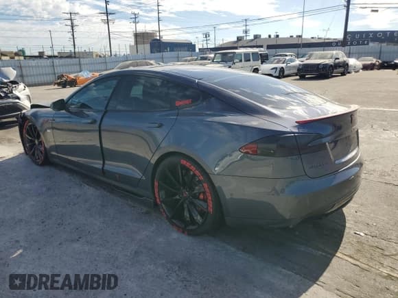 ✅ 2014 Tesla Model S P85D • VIN: 5YJSA1H29EFP69154 • Lot: 85721115. Listed on Copart with 123,645 mi. Free auction sales archive from the USA and detailed vehicle history report at DreamBid. Image 2.