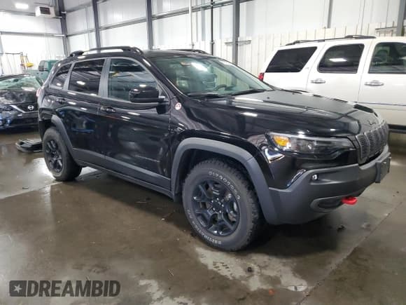 ✅ 2022 Jeep Cherokee Trailhawk • VIN: 1C4PJMBX8ND532075 • Лот: 86162455. Опубликован ранее на Copart с пробегом 22 975 миль. Бесплатный доступ к архиву аукционных продаж из США и подробный отчёт об истории автомобиля на DreamBid. Изображение 4.