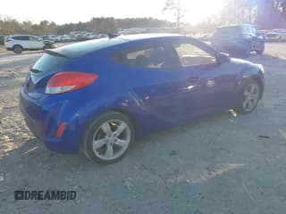 ✅ 2014 Hyundai Veloster • VIN: KMHTC6AD7EU199939 • Lot: 41289277. Wystawiony na IAAI z przebiegiem 192 798 mil. Bezpłatny archiwum sprzedaży aukcyjnych z USA i szczegółowy raport historii pojazdu na DreamBid. Zdjęcie 4.