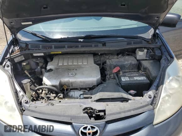 2009 Toyota Sienna LE with VIN 5TDBK23C59S026009, listed as a Copart auction lot 64553505 with 187,214 mi miles and Salvage title. Bid and sale history available at DreamBid. Image 12.