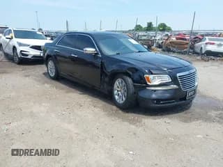✅ 2012 Chrysler 300 C • VIN: 2C3CCAET4CH288784 • Lot: 39522457. Listed on IAAI with 185,234 mi. Free auction sales archive from the USA and detailed vehicle history report at DreamBid. Image 1.