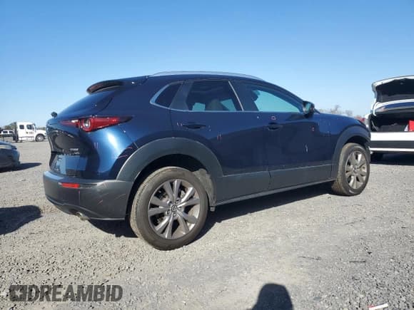 ✅ 2022 Mazda CX-30 S Preferred • VIN: 3MVDMBCL8NM410202 • Lot: 91819235. Listed on Copart with 23,526 mi. Free auction sales archive from the USA and detailed vehicle history report at DreamBid. Image 3.