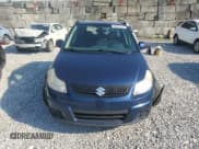 ✅ 2010 Suzuki SX4 • VIN: JS2YB5A35A6310149 • Lot: 66065105. Listed on Copart with 99,656 mi. Free auction sales archive from the USA and detailed vehicle history report at DreamBid. Image 5.