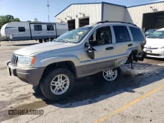 ✅ 2003 Jeep Grand Cherokee • VIN: 1J8GX48S63C519363 • Lot: 67484154. Listed on Copart with 354,320 mi. Free auction sales archive from the USA and detailed vehicle history report at DreamBid. Image 1.