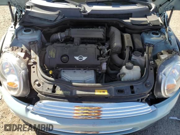 2013 MINI Hardtop with VIN WMWSU3C55DT681697, listed as a Copart auction lot 50325745 with 68,386 mi miles and Salvage title. Bid and sale history available at DreamBid. Image 11.