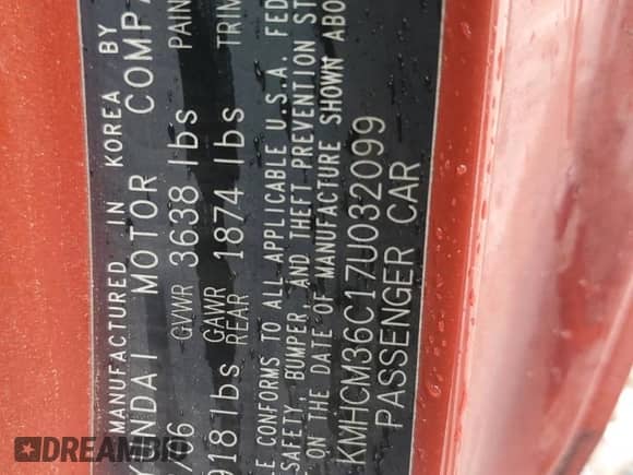 2007 Hyundai Accent GS z VIN KMHCM36C17U032099, wystawiony jako Copart lot #73319964 z przebiegiem 341 502 mil mil oraz Szkoda całkowita • Salvage title. Historia ofert i sprzedaży dostępna na DreamBid. Obrazek 14.