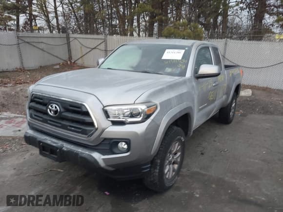 ✅ 2016 Toyota Tacoma SR • VIN: 5TFSX5EN7GX041460 • Lot: 41311306. Listed on IAAI with Not provided. Free auction sales archive from the USA and detailed vehicle history report at DreamBid. Image 2.