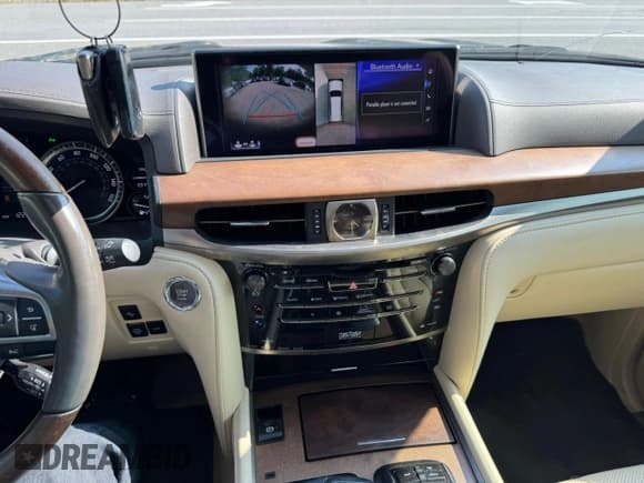 ✅ 2016 Lexus LX 570 • VIN: JTJHY7AX1G41961XX • Lot: 68714525. Wystawiony na Copart z przebiegiem 122 524 mil. Bezpłatny archiwum sprzedaży aukcyjnych z USA i szczegółowy raport historii pojazdu na DreamBid. Zdjęcie 12.