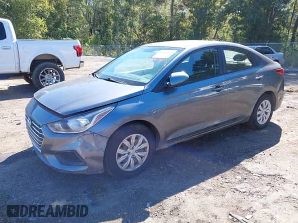 2019 Hyundai Accent SE z VIN 3KPC24A38KE080617, wystawiony jako IAAI lot #43469463 z przebiegiem 156 782 mil mil oraz . Historia ofert i sprzedaży dostępna na DreamBid. Obrazek 2.