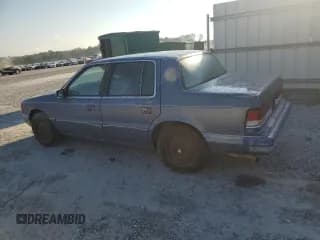 ✅ 1992 Plymouth Acclaim • VIN: 1P3XA46K8NF255561 • Lot: 74290964. Wystawiony na Copart z przebiegiem 126 154 mil. Bezpłatny archiwum sprzedaży aukcyjnych z USA i szczegółowy raport historii pojazdu na DreamBid. Zdjęcie 2.