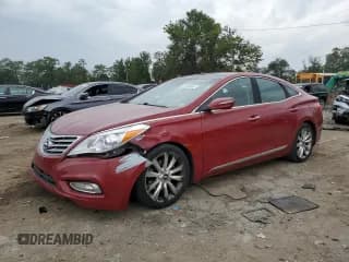 ✅ 2013 Hyundai Azera • VIN: KMHFH4JG2DA269960 • Лот: 82105665. Опубликован ранее на Copart с пробегом 164 625 миль. Бесплатный доступ к архиву аукционных продаж из США и подробный отчёт об истории автомобиля на DreamBid. Изображение 1.