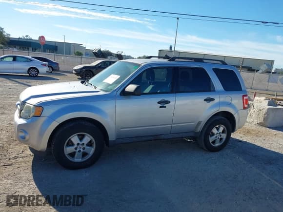 ✅ 2012 Ford Escape XLT • VIN: 1FMCU0DG7CKB62771 • Lot: 43605120. Listed on IAAI with 173,264 mi. Free auction sales archive from the USA and detailed vehicle history report at DreamBid. Image 15.