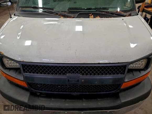 ✅ 2014 Chevrolet Express Cargo • VIN: 1GCWGFCG0E1114535 • Lot: 94756005. Listed on Copart with 343,899 mi. Free auction sales archive from the USA and detailed vehicle history report at DreamBid. Image 12.